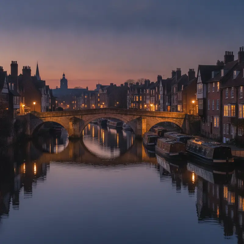Stone bridge over the River Ouse in York at dusk